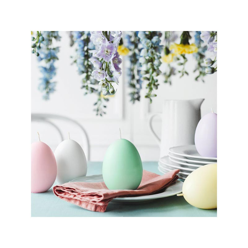 Bougie en forme d'oeuf vert pastel