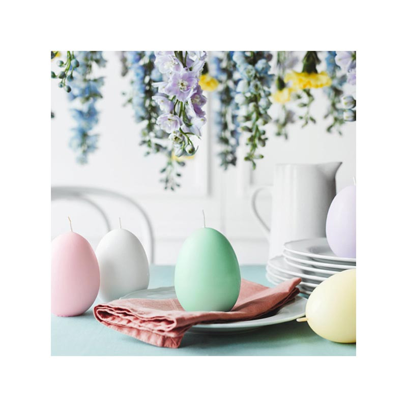 Bougie en forme d'oeuf vert pastel